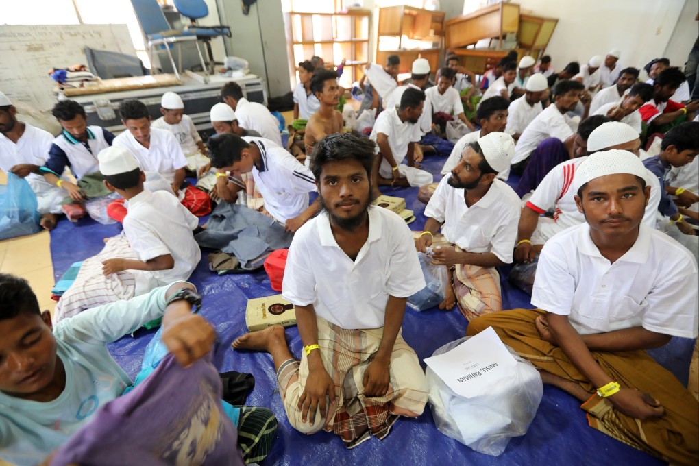 Rohingya refugees rest in a temporary shelter at the Indonesian Red Cross Office, after being evacuated from the sea at Meulaboh, West Aceh, Indonesia, on March 22. Photo: EPA-EFE