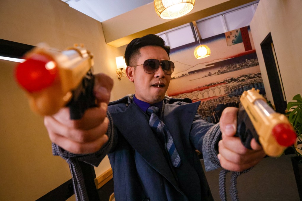 An actor recreates a scene from the classic Hong Kong film A Better Tomorrow as part of a promotional event for the festival. Photo: Dickson Lee