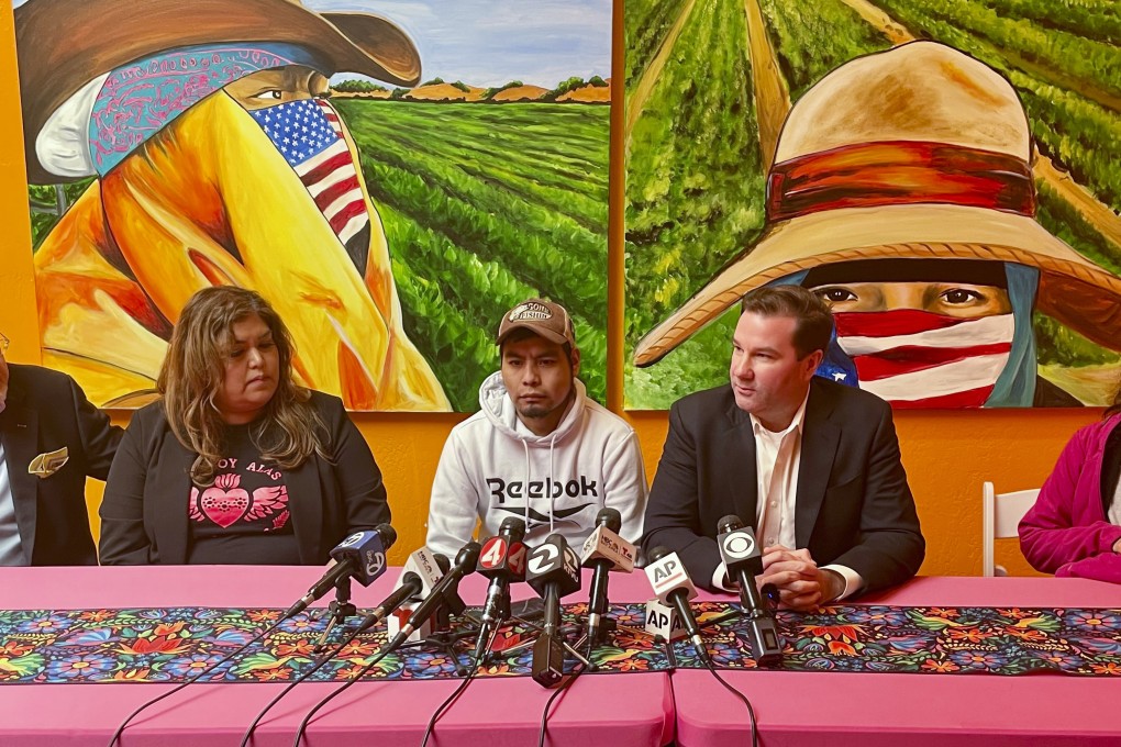 Pedro Romero Perez (centre) sits next to his lawyer Donald Magilligan during a press conference in Half Moon Bay, California, on Friday. Photo: AP