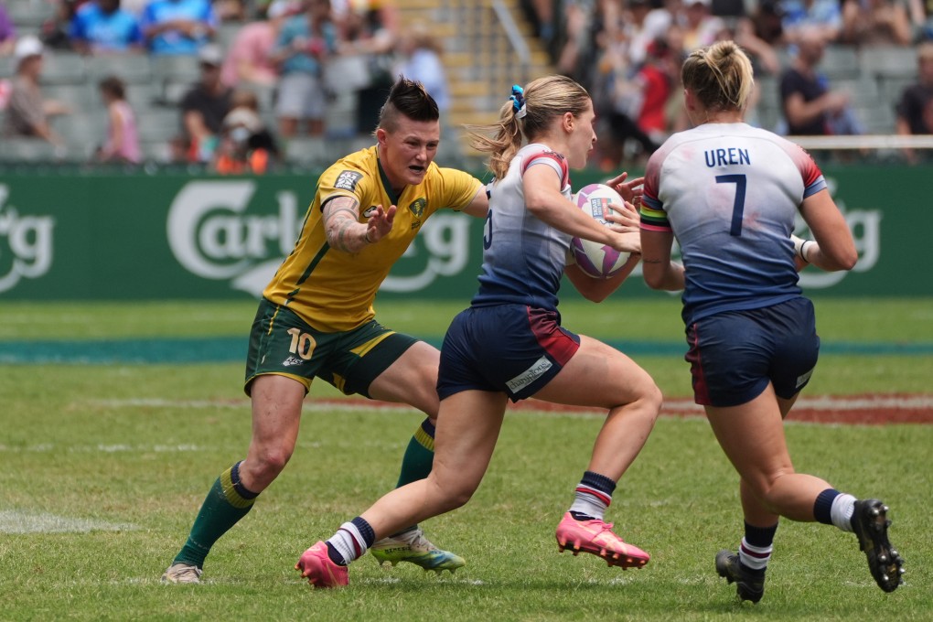 Great Britain’s Shona Campbell tries to get past Brazil’s Raquel Kochhann, with Emma Uren in support. Photo: Eugene Lee