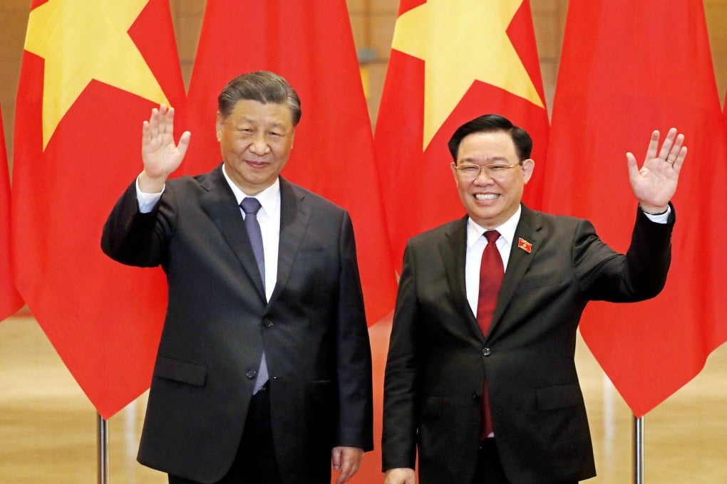 Chinese President Xi Jinping (left) and Vuong Dinh Hue, chairman of the National Assembly of Vietnam, in Hanoi in December, when the two countries agreed to build a “community with a shared future”. Photo: AFP