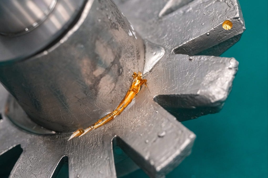 Customs officers found that gold items had been concealed as machine parts and painted in silver. Photo: Sam Tsang