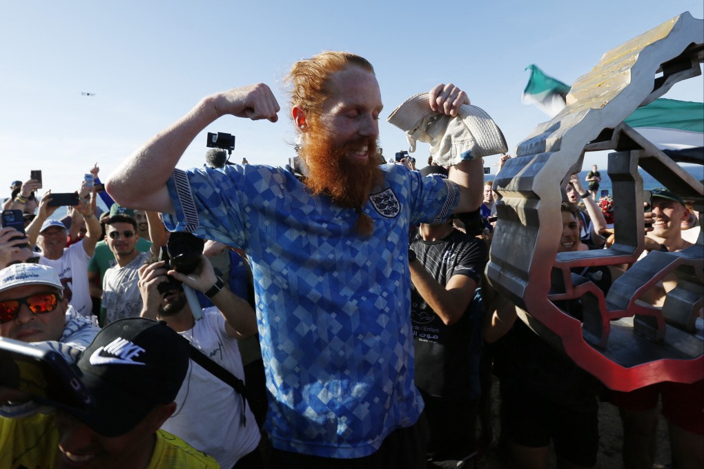 Britain’s Russ Cook celebrates on Sunday. Photo: Reuters