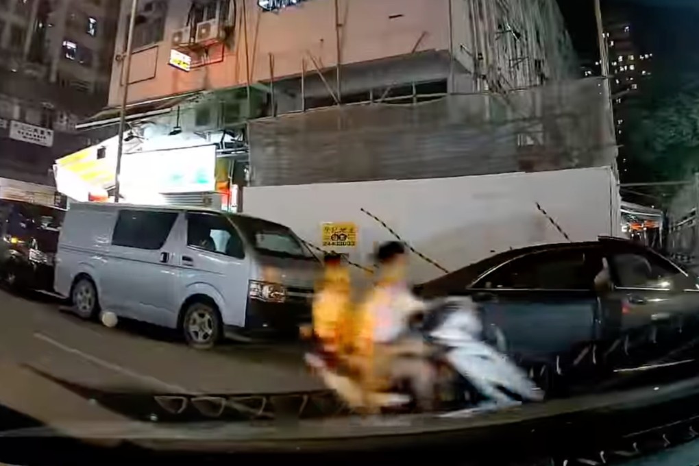 The videos show two teenagers riding a motorbike as they swerve between the road and pavement. Photo: Facebook/Eric So