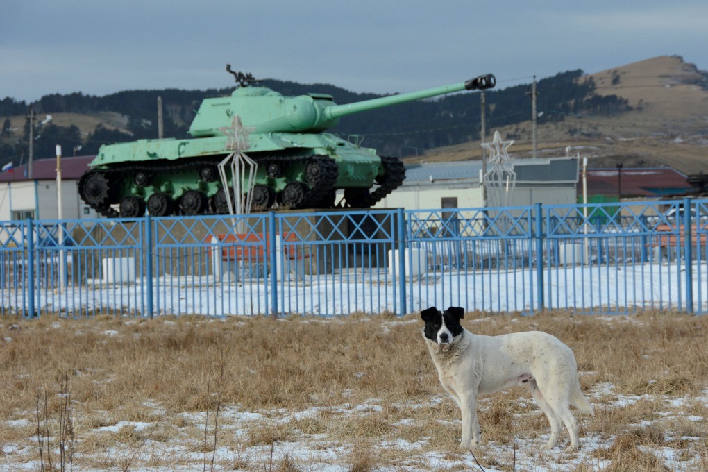 A WWII-era Soviet IS-2 tank stands in the village of Malokurilskoye on the island of Shikotan – one of the Kuril Islands annexed by Soviet forces in the closing days of the conflict. Photo: Reuters