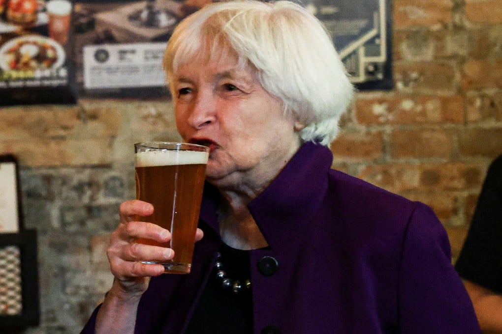 US Treasury secretary Janet Yellen tastes a glass of beer at Jing-A Brewing Co in Beijing. Chinese internet users and politicians have been obsessed with what Yellen is eating and drinking in China. Photo: Reuters