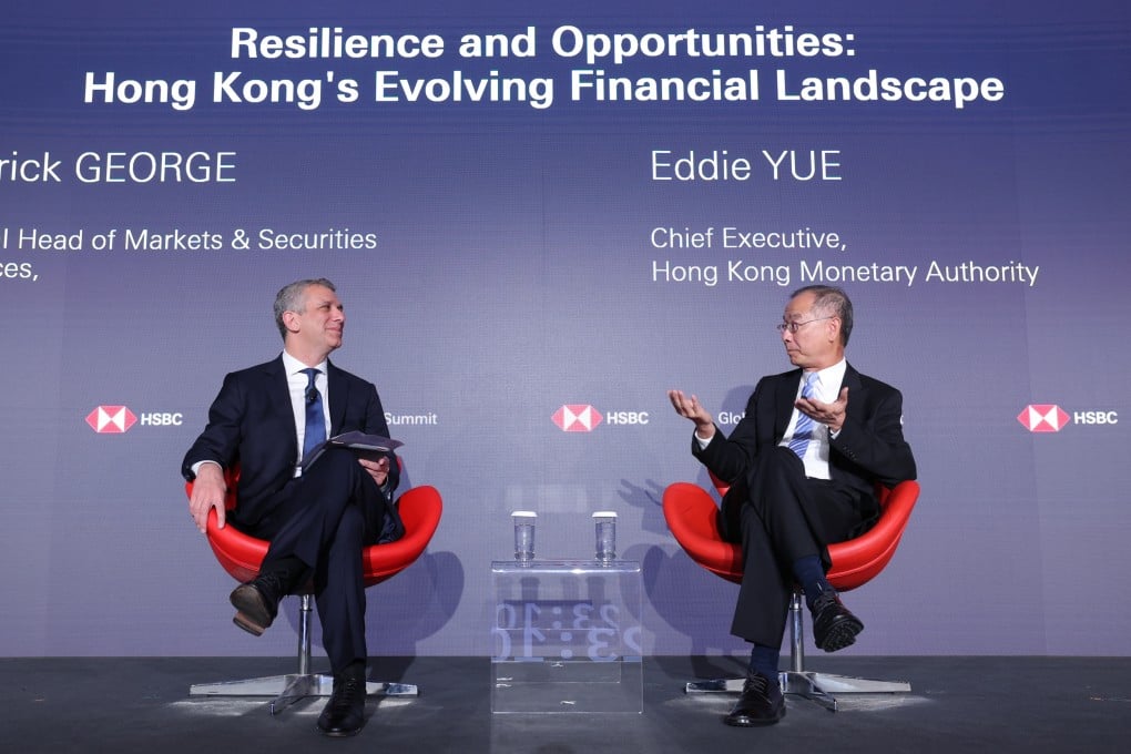 Patrick George, HSBC’s global head of markets and securities services, and Eddie Yue during the summit on Tuesday. Photo: Handout