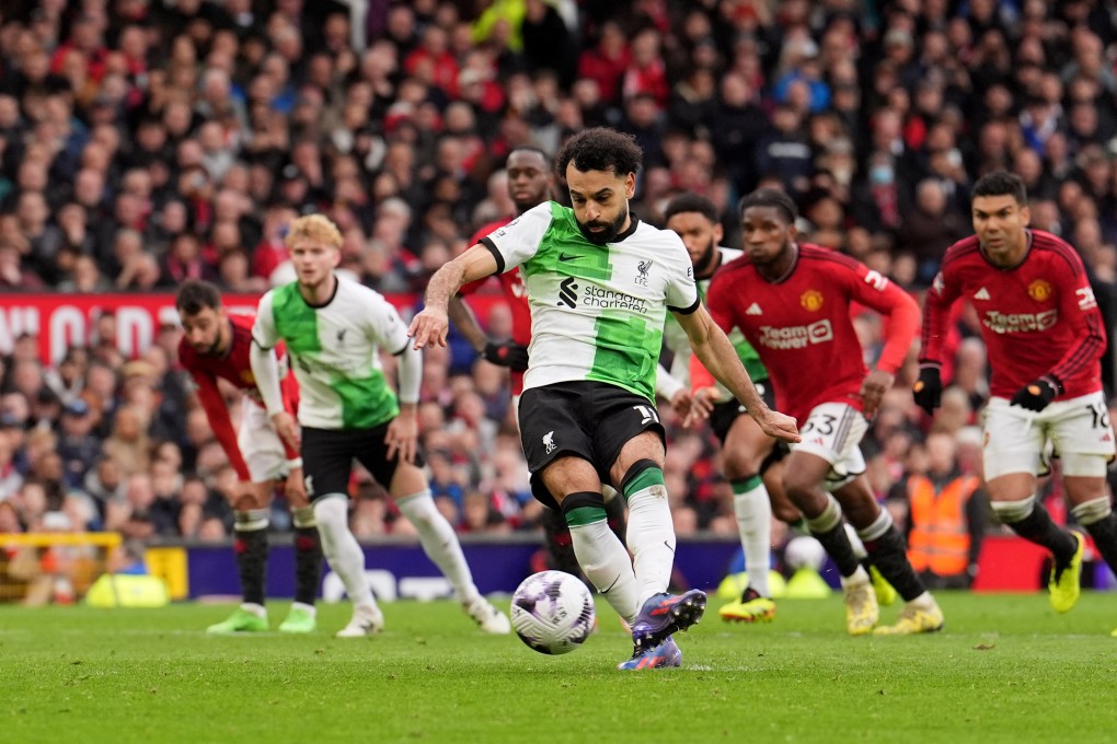 Liverpool’s Mohamed Salah scores his team’s second goal of the game during their English Premier League soccer match against Manchester United. Photo: dpa