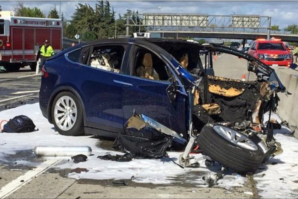 Emergency personnel at the scene of the 2018 crash. File photo: KTVU-TV via AP