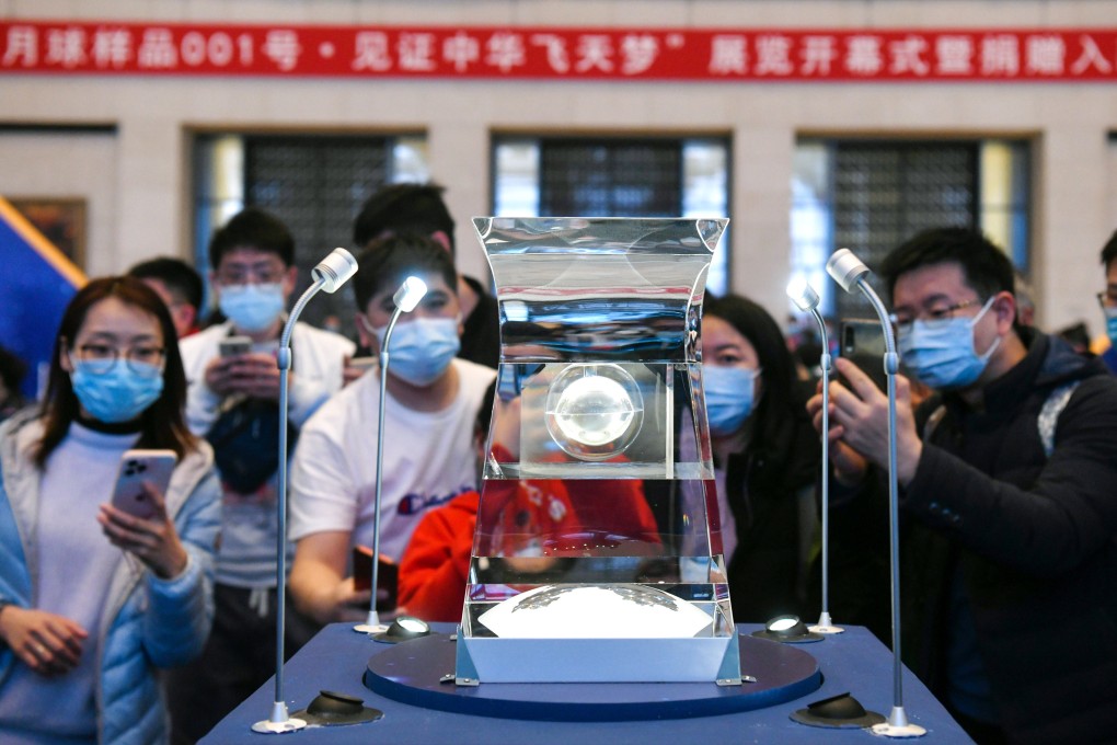People view lunar samples brought back by China’s Chang’e 5 probe at the National Museum of China in Beijing in 2021. Some of those samples will be loaned to scientists from other countries. Photo: Xinhua
