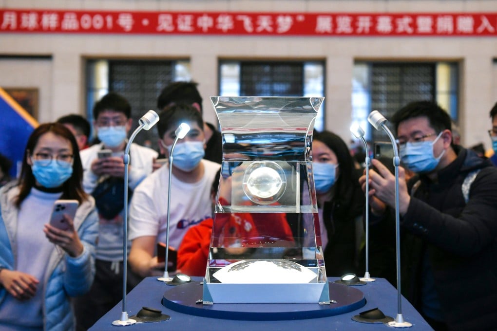 People view lunar samples brought back by China’s Chang’e 5 probe at the National Museum of China in Beijing in 2021. Some of those samples will be loaned to scientists from other countries. Photo: Xinhua