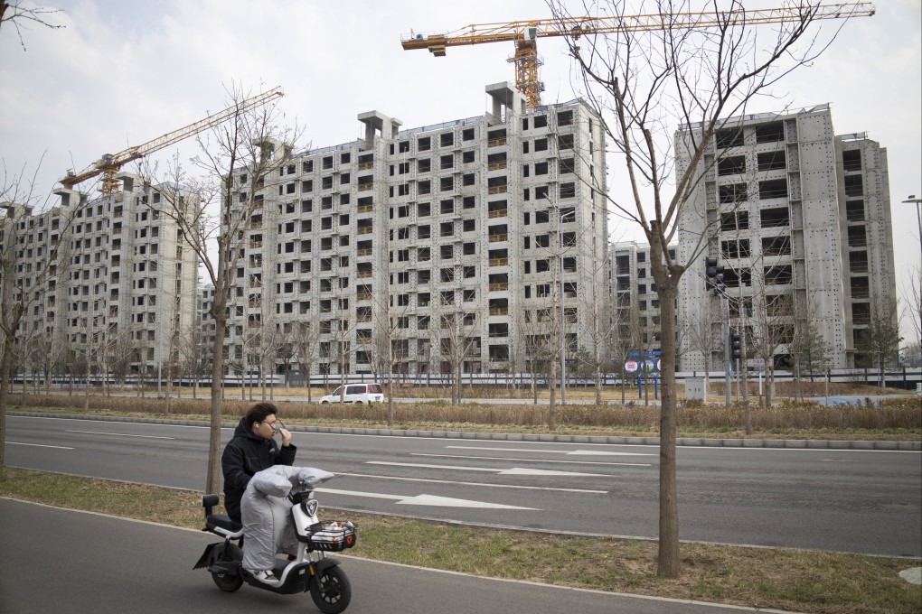 Fitch Ratings made the move due to concerns over China’s property and public finance stress. Photo: EPA-EFE
