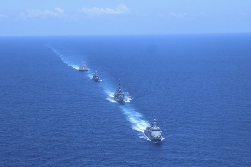 Philippine, Australian, Japanese and US warships sail in a column formation during join drills in the South China Sea on Sunday. Photo: Armed Forces of the Philippines via AP