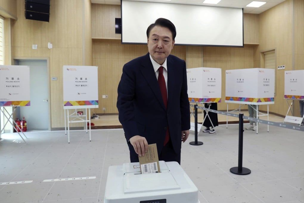 South Korean President Yoon Suk-yeol casts his vote at a polling station in Busan. Yoon’s ruling People Power Party suffered a crushing a defeat in the April 10 general election. Photo: Yonhap via AP