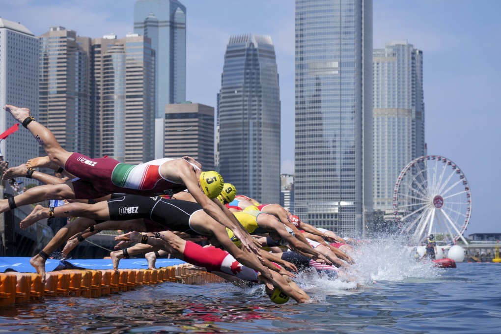 Competitors take the plunge at the Triathlon World Cup held in Hong Kong last month. The National Games event will also be held at Victoria Harbour. Photo: Elson Li