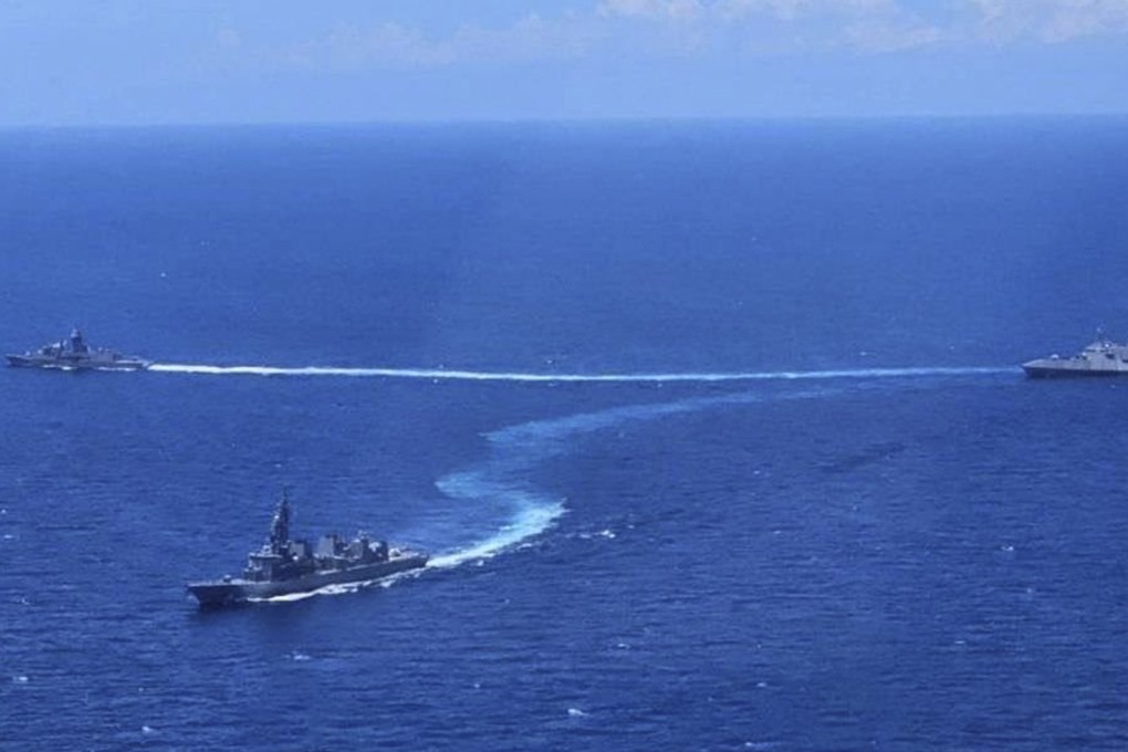 Navy ships from the US, Japan and Australia take part in the first multilateral maritime cooperative activity at the disputed South China Sea on April 7. Photo: Armed Forces of the Philippines via AP