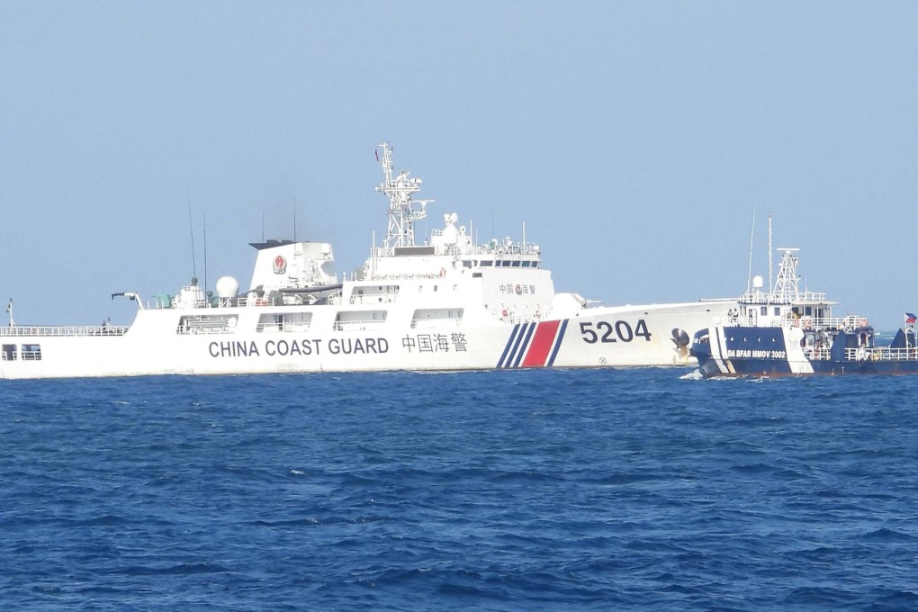 A Chinese Coast Guard ship (Left) blocking a Bureau of Fisheries and Aquatic Resources ship (Right) in the disputed South China Sea. Photo: Philippine Coast Guard via AFP