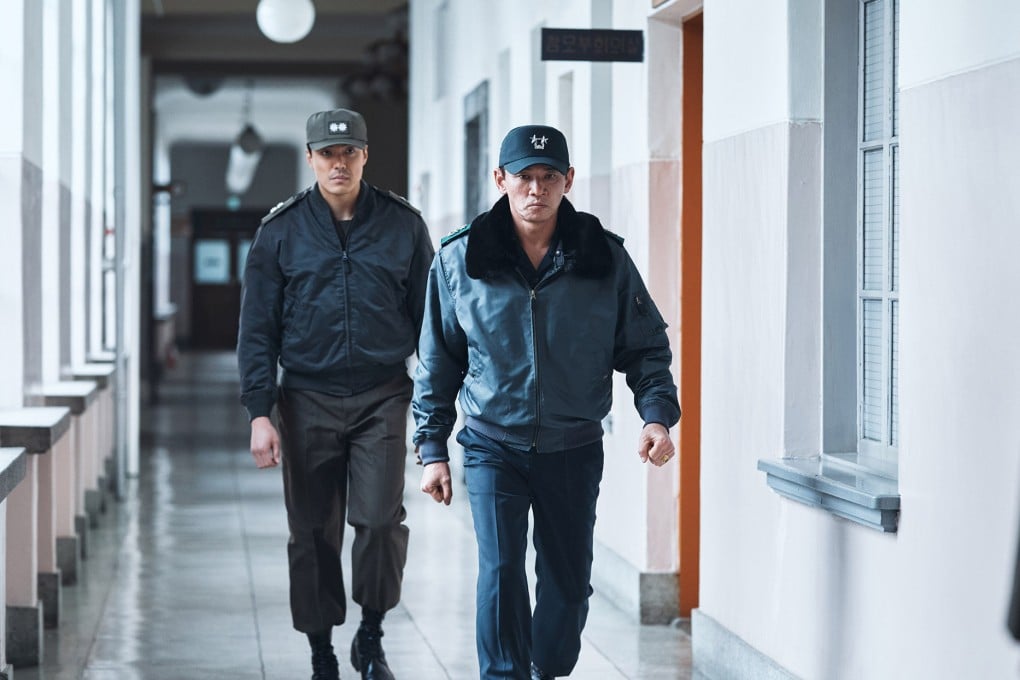 Hwang Jung-min (front) embodies South Korea’s power-grabbing Major General Chun Doo-hwan in a still from 12.12: The Day – directed by Kim Sung-su and co-starring Jung Woo-sung. Photo: Plus M Entertainment and Hive Media Corp.