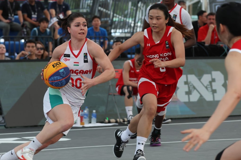 Hungary’s Klaudia Pappu (left) takes on Hong Kong during the 3x3 Olympic qualifying event. Photo: Yik Yeung-man