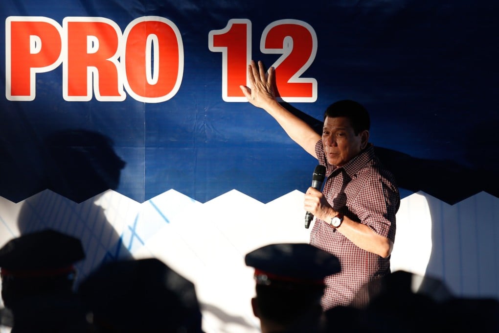 Philippine President Rodrigo Duterte gestures as he gives directives to police officers over his campaign against illegal drugs at the headquarters of Philippine National Police in General Santos City in September 2016. Photo: Jeoffrey Maitem