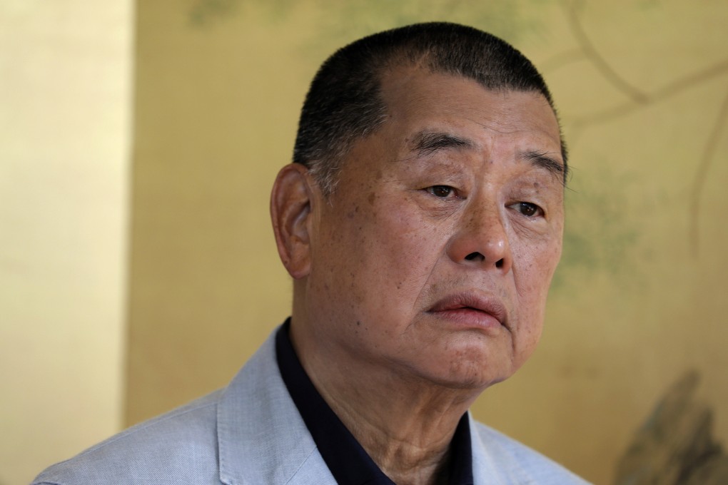 A witness describes his links to tycoon Jimmy Lai and others during the trial of the owner of the now-closed Apple Daily newspaper on conspiracy charges. Photo: AP