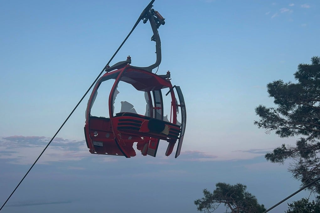 A severely damaged cabin of a cable car transportation system is seen outside Antalya, southern Turkey, Friday, April 12, 2024. Photo: Dia Images via AP