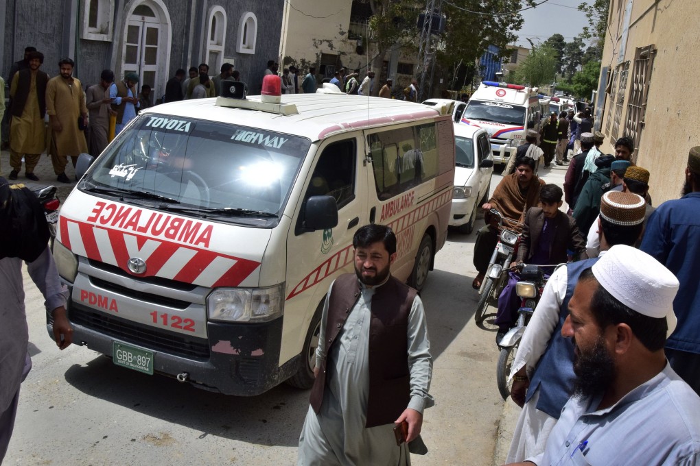 An ambulance carrying the bodies of people killed by gunmen arrives at a hospital in Quetta, Pakistan, on Saturday. Photo: AP