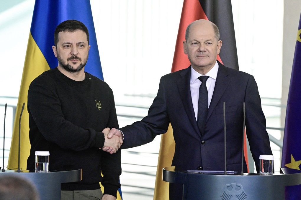 German Chancellor Olaf Scholz (right) and Ukraine’s President Volodymyr Zelensky shake hands after a press conference in Berlin in February. Berlin said on Saturday that it will give Kyiv more weapons to help in its fight against Moscow. Photo: AFP