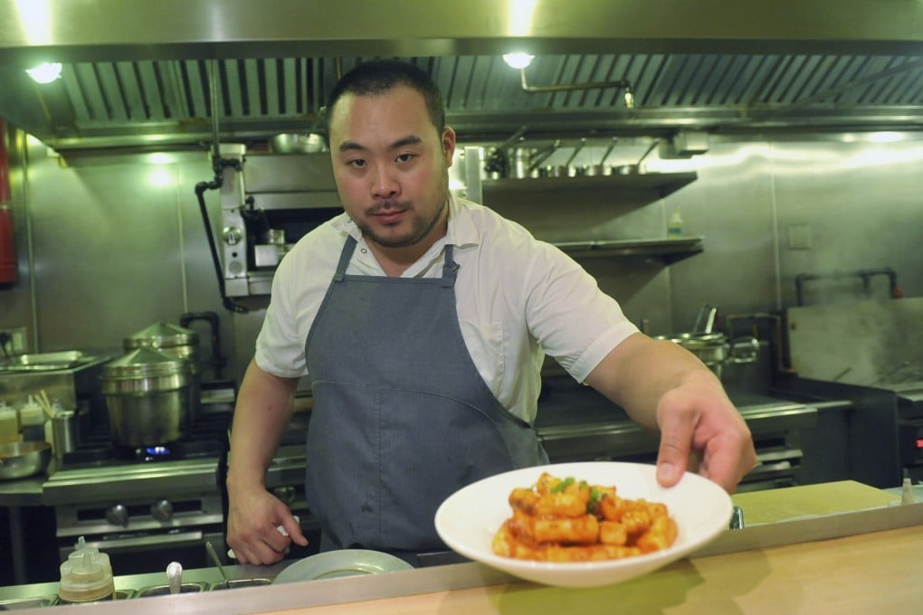 Celebrity chef David Chang presents a dish at Momofuku Noodle Bar in New York in November 2011. Photo: AP
