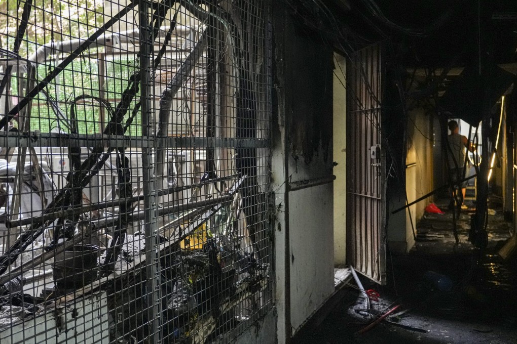 The corridors of New Lucky House are littered with debris. Photo: May Tse