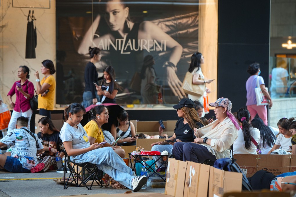 Domestic helpers gather in Central on their day off. Photo: Sam Tsang