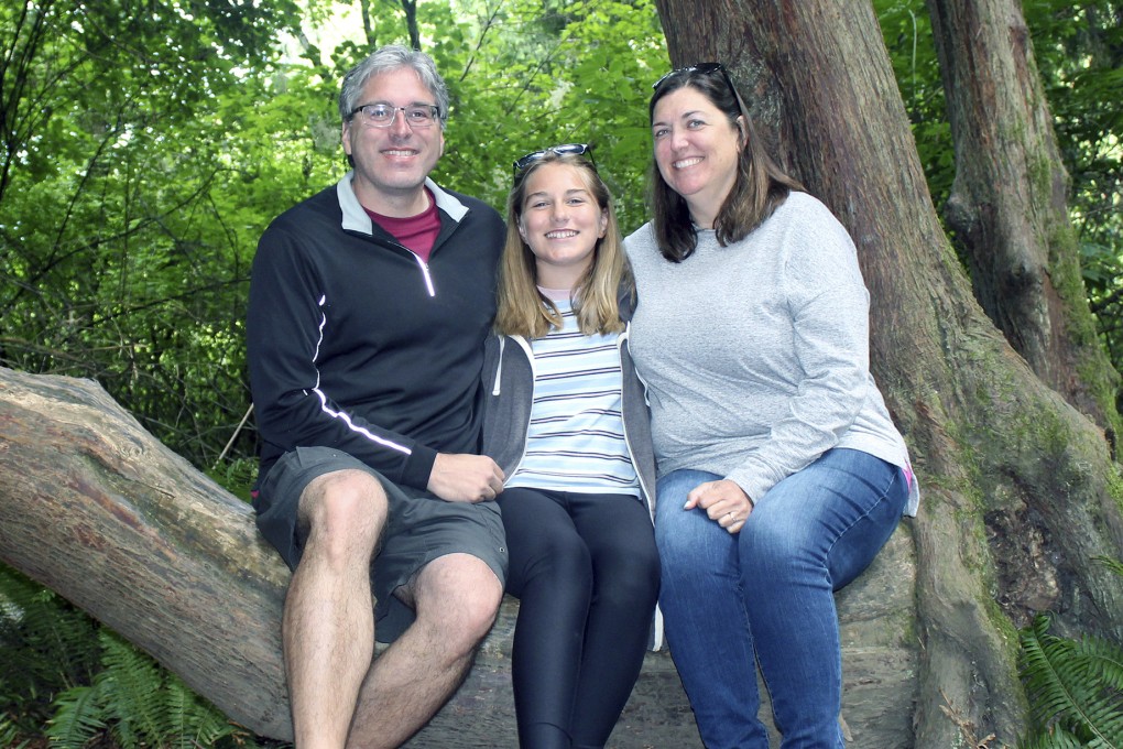 (From left) Public relations professional Barry Kluczyk, his daughter Mary and wife Carrie rest on a hiking trail in the Dungeness National Wildlife Refuge, during a Seattle-based mini-sabbatical. Photo: AP