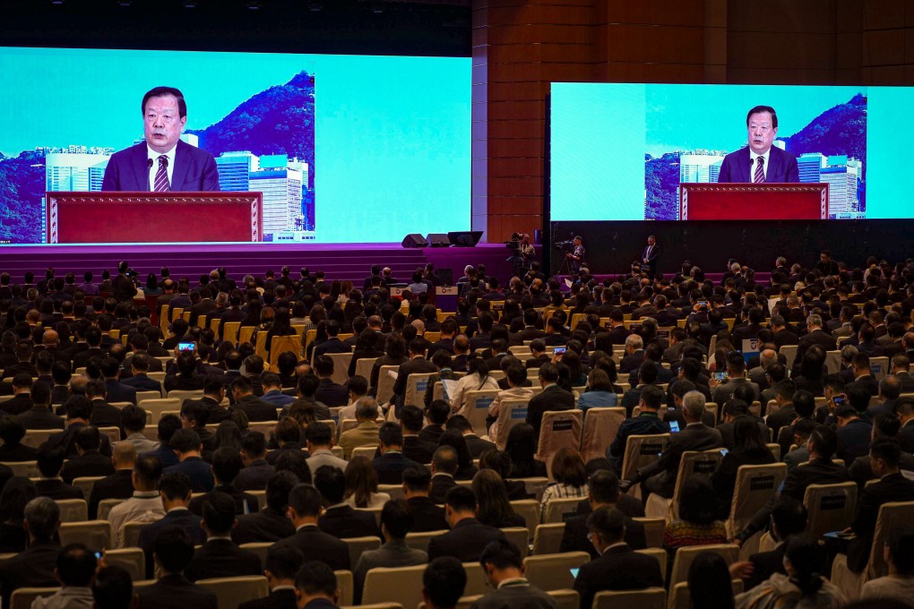 Xia Baolong, the director of the Hong Kong and Macau Affairs Office, delivers a speech by video link for the National Security Education Day opening ceremony. Photo: Eugene Lee