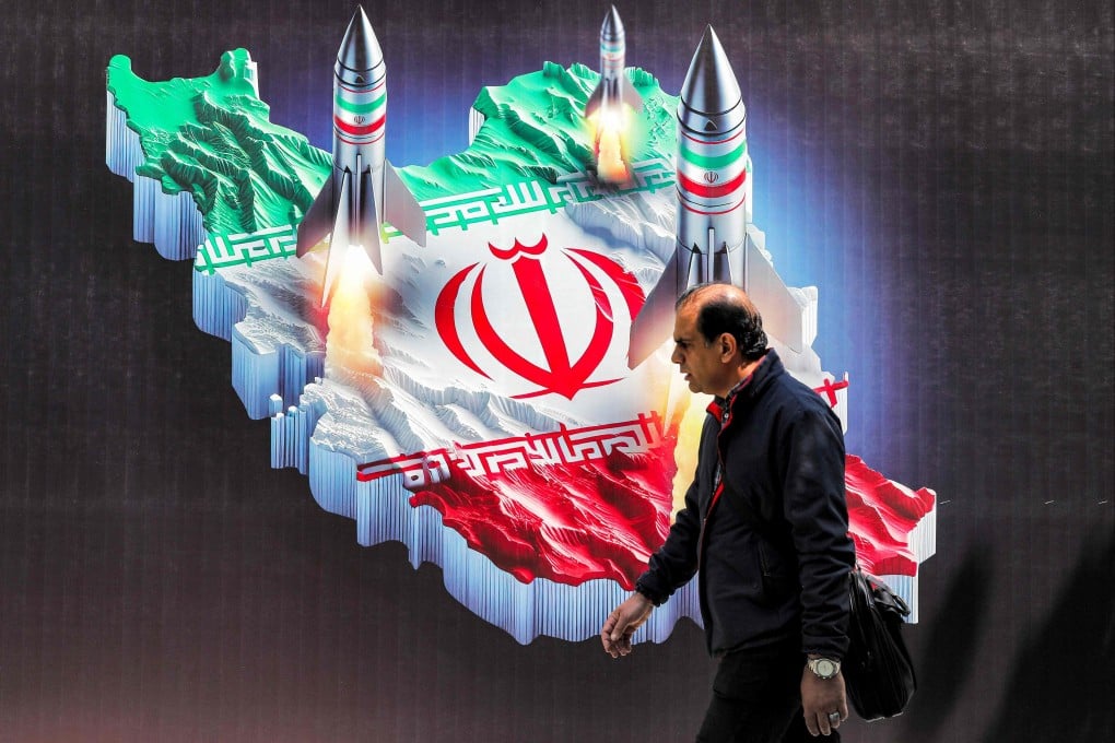 A banner in Iran’s capital Tehran. An Iranian attack on the weekend, involving dozens of missiles and drones, caused only modest damage in Israel. Photo: AFP