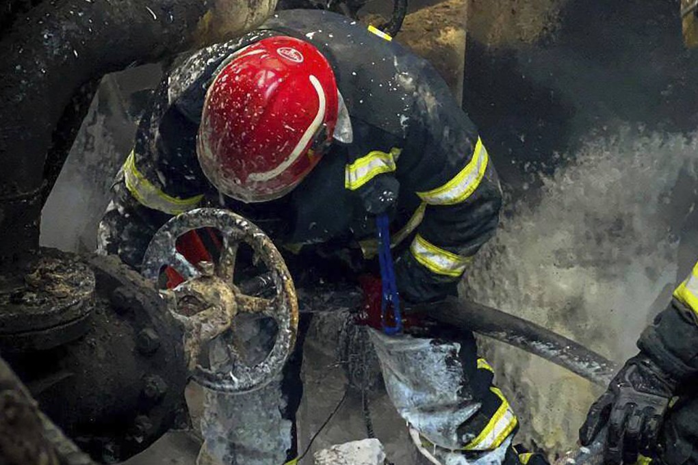 Workers extinguish a fire after a Russian attack on the Trypilska thermal power plant in the Kyiv region, Ukraine on April 11. Photo: Ukrainian Emergency Service via AP