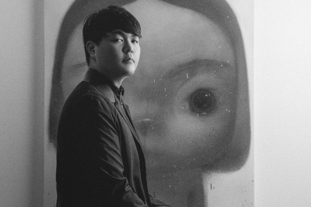 Young Korean collector Noh Jae-myung with Roby Dwi Antono’s Untitled (2021). Noh is launching a new art fair in Seoul, called Art OnO, which will focus on emerging contemporary artists. Photo: Art OnO