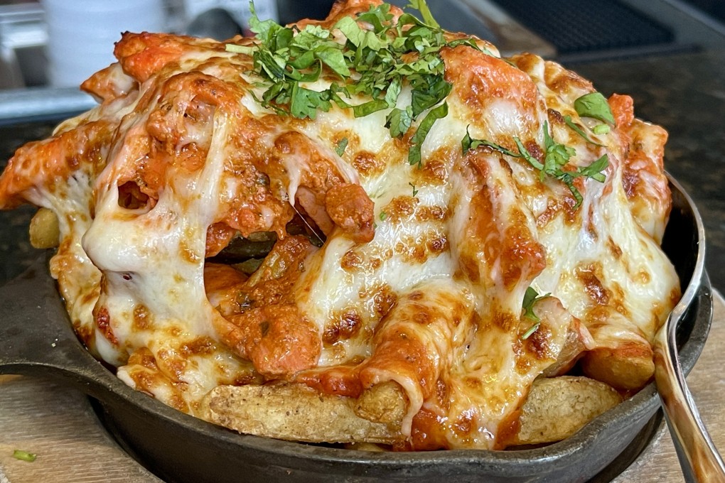 Nashville, Tennessee, famous for music, is making a name for itself among foodies. We look at three restaurants: Chauhan Ale and Masala House, XiaoBao and Aubrey. Above: chicken tikka poutine from Chauhan Ale and Masala House.  Photo: Chris Dwyer