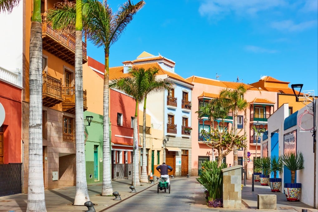 The Canary Islands, off northwest Africa, are drafting a strict law to curb short-term holiday lets, many of which are company-owned. Above: A street in the old town of Puerto de la Cruz, Tenerife, in The Spanish Canaries. Photo: Shutterstock