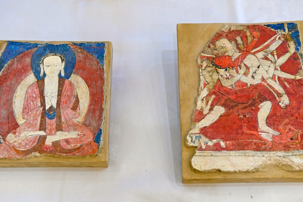 A group of 38 Chinese artefacts, including these highly decorative mural fragments, have been returned to China by the US under a repatriation agreement. Photo: Xinhua