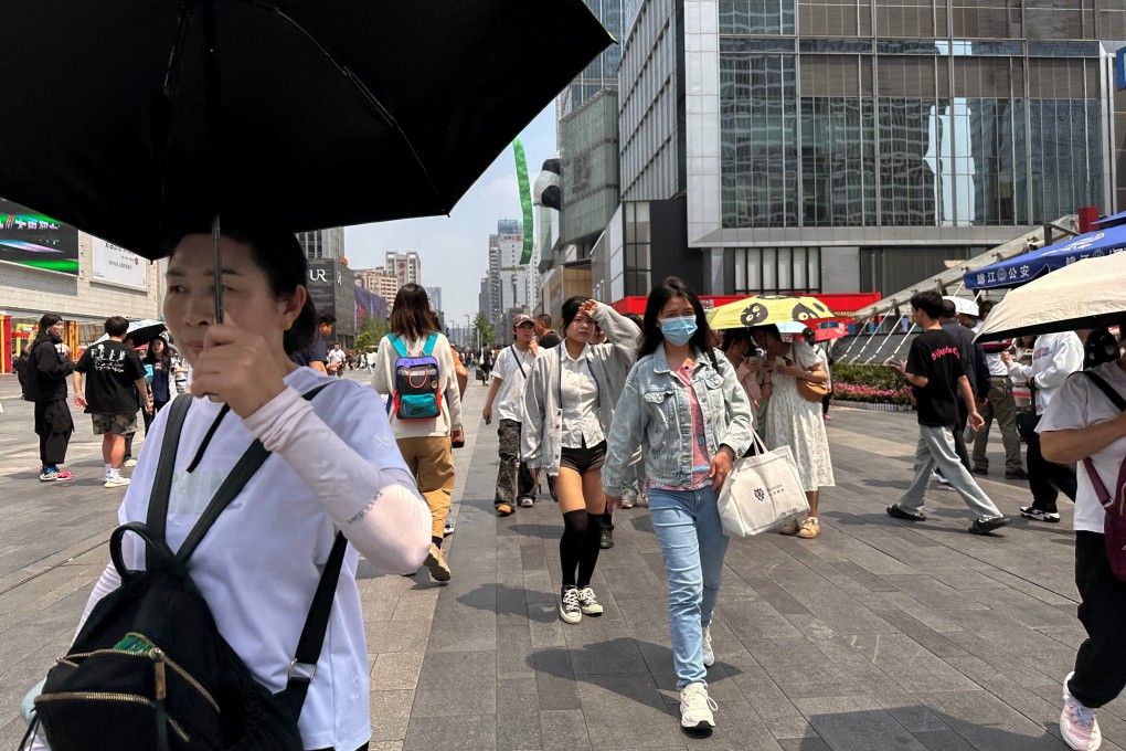 People walk at a shopping area in Chengdu, Sichuan province, on April 13, 2024. Photo: Reuters