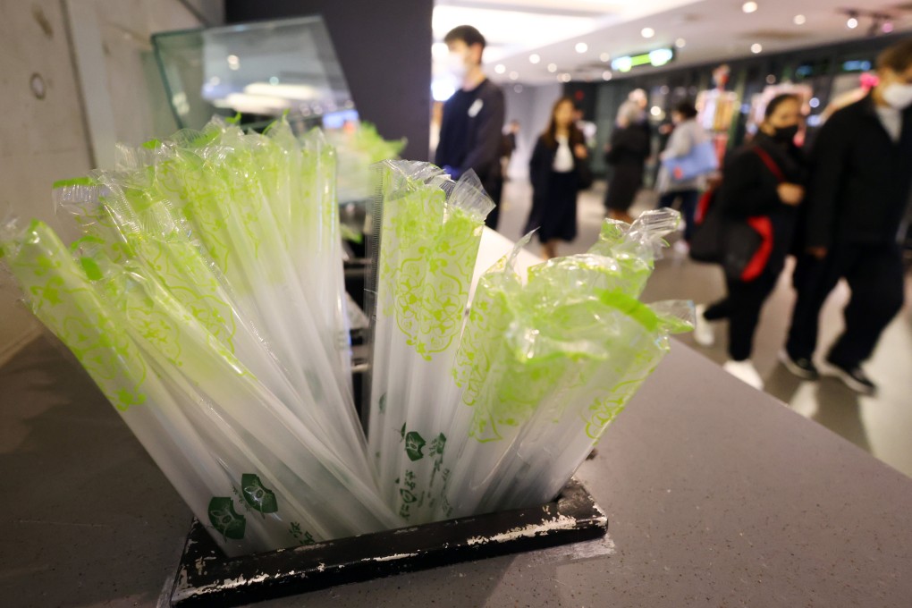 People walk past single-use straws at a take-away counter at a mall in Admiralty on January 24. The distribution of such items is no longer permitted. Photo: Dickson Lee