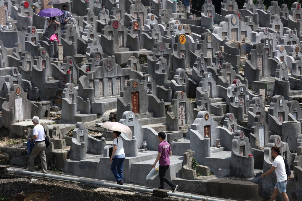 People at the cemetery in Diamond Hill during the Ching Ming Festival in April 2018. Long waiting times at cemeteries and public columbariums have made the idea of scattering the ashes of loved ones in designated gardens or at sea more popular. Felix Wong