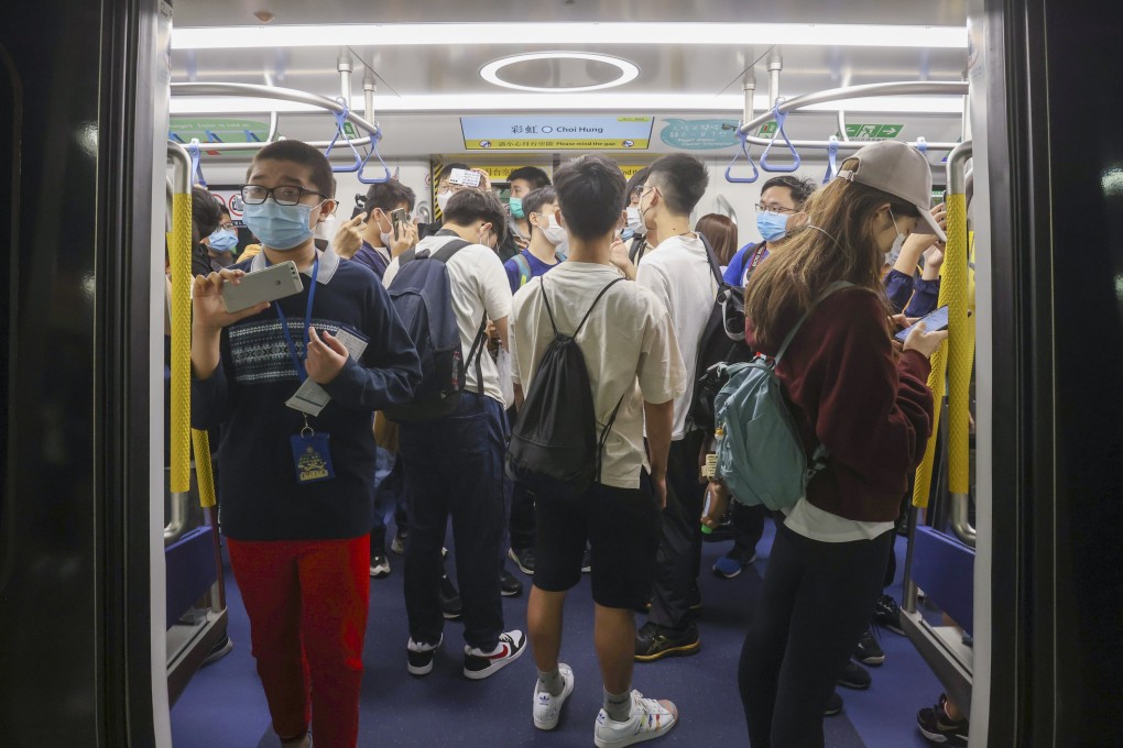Rail fans take a new Q-train from Choi Hung MTR station on November 27, 2022. The Q-trains being rolled out on the Island and Tsuen Wan Lines were ordered nearly a decade prior. Photo: Jonathan Wong