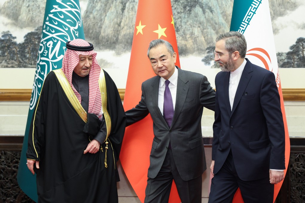 Chinese Foreign Minister Wang Yi with Saudi Deputy Foreign Minister Waleed Elkhereiji (left) and his Iranian counterpart Ali Bagheri Kani in Beijing on December 15, 2023. Analysts say Beijing has contributed little to current diplomatic efforts in the Middle East. Photo: Xinhua