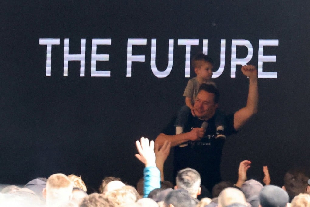 Tesla CEO Elon Musk and his son visit the company’s gigafactory in Germany on March 13. Photo: Reuters