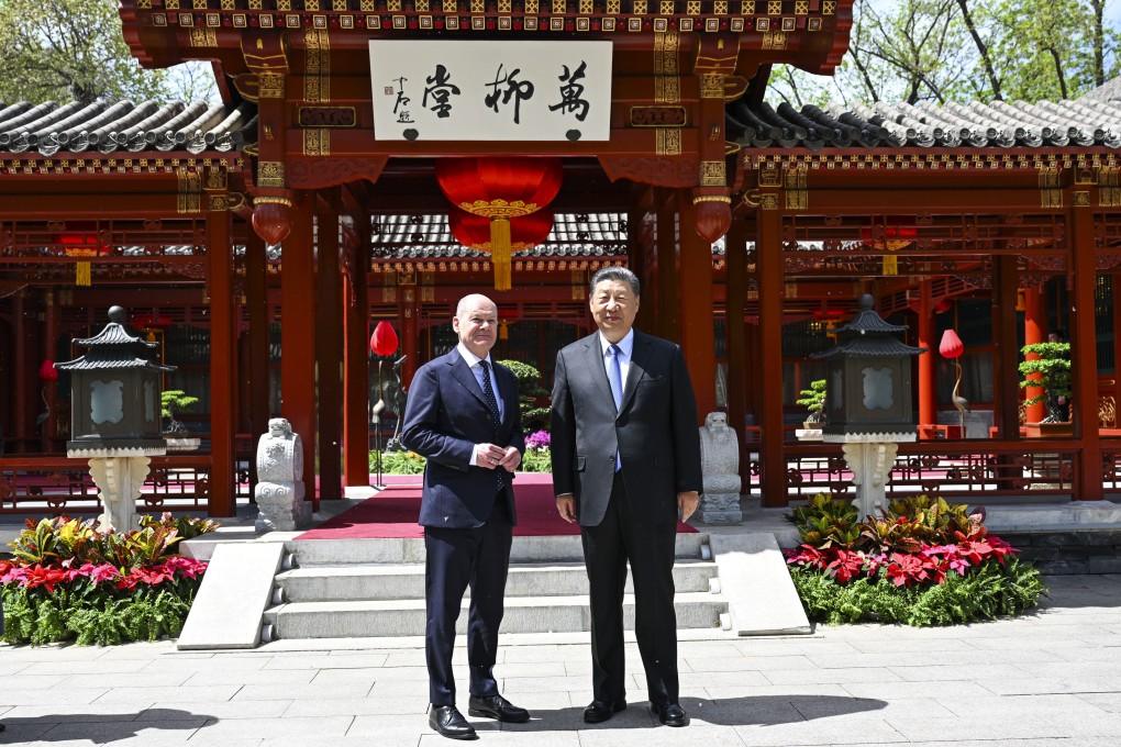 German Chancellor Olaf Scholz and Chinese President Xi Jinping pose for a photo in Beijing, China, on Tuesday. Photo: Xinhua via AP