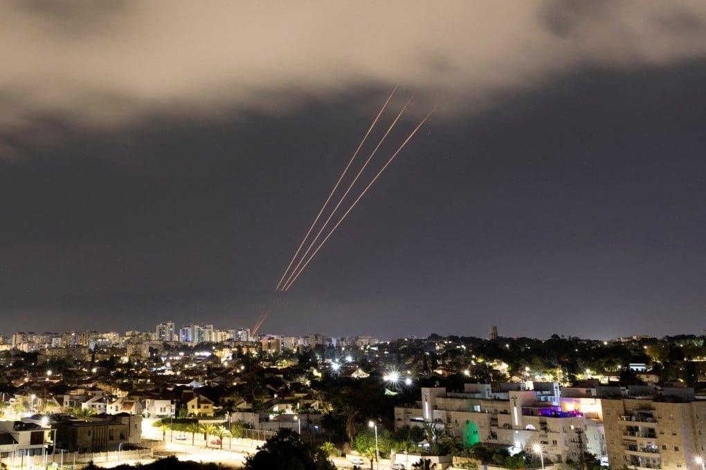 Israel’s anti-missile system responds to Iran’s drones and missiles on April 14. The cost of the 200-300 Iranian projectiles and the estimated US$50,000 price of each of the hundreds of Tamir interceptor missiles deployed add up to a multimillion-dollar bill for just one night. Photo: Reuters