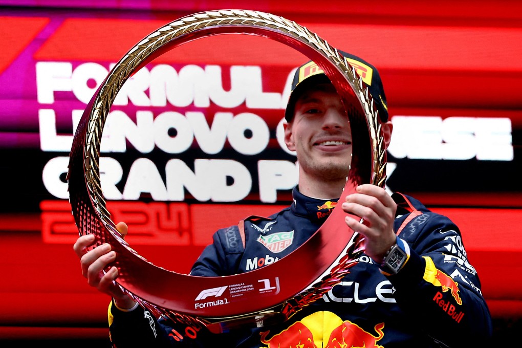 Red Bull’s Max Verstappen celebrates on the podium after winning the Chinese Grand Prix. Photo: Reuters