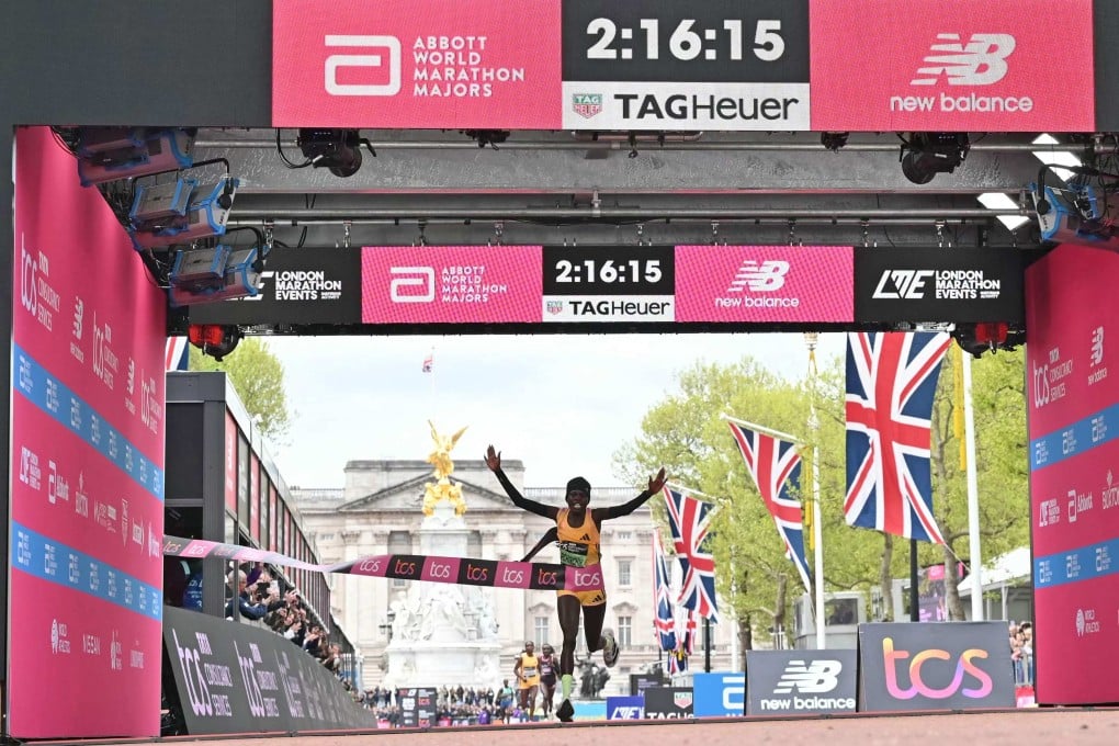 Kenya’s Peres Jepchirchir crosses the line to win the women’s race in a world record time. Photo: AFP