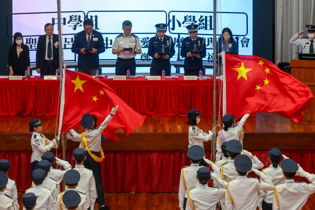 Hong Kong school pupils participate in a flag-bearing competition. Photo: Jonathan Wong